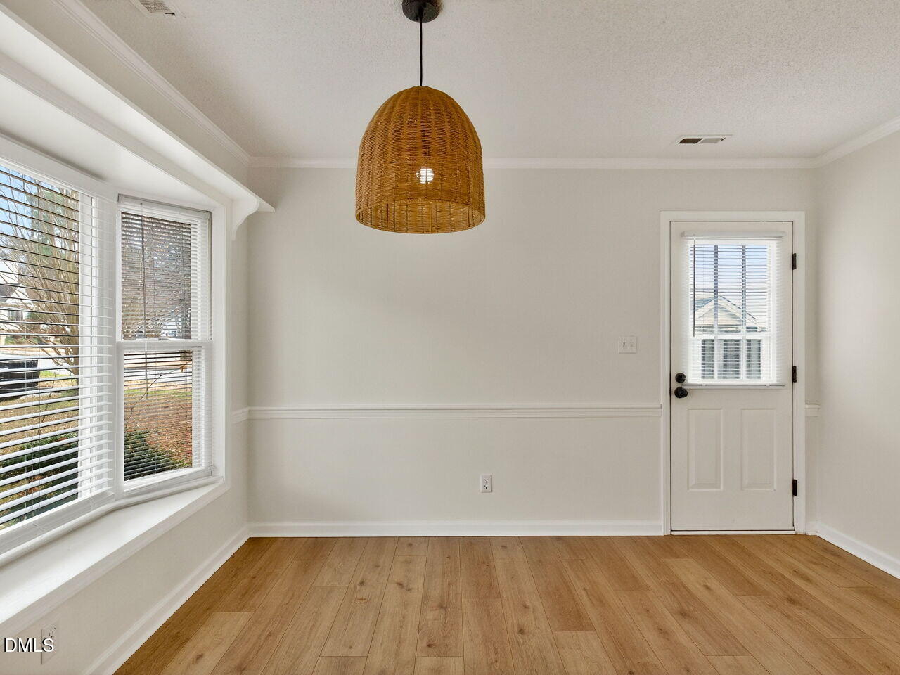 113 Towne View Trail Garner, NC 27529 - Photo 11 of 30 a view of a livingroom with wooden floor and a window