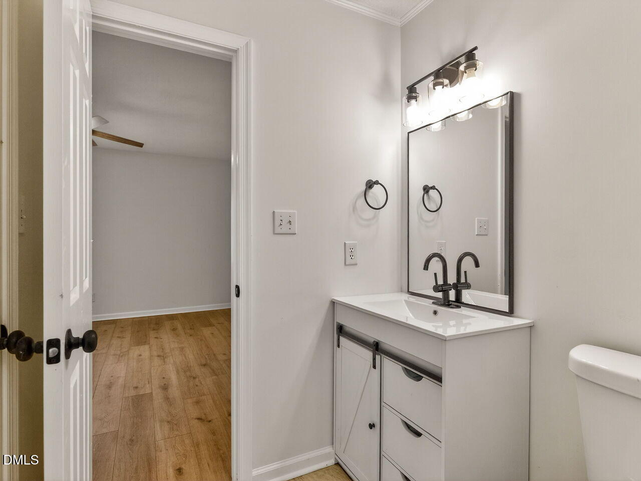 113 Towne View Trail Garner, NC 27529 - Photo 21 of 30 a bathroom with a sink mirror and vanity