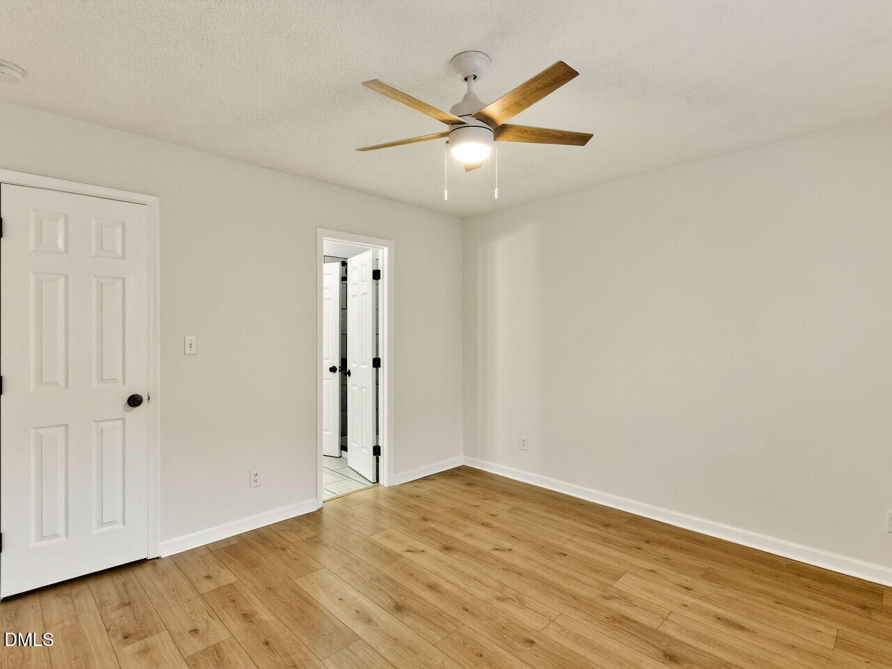 113 Towne View Trail Garner, NC 27529 - Photo 26 of 30 an empty room with wooden floor and windows