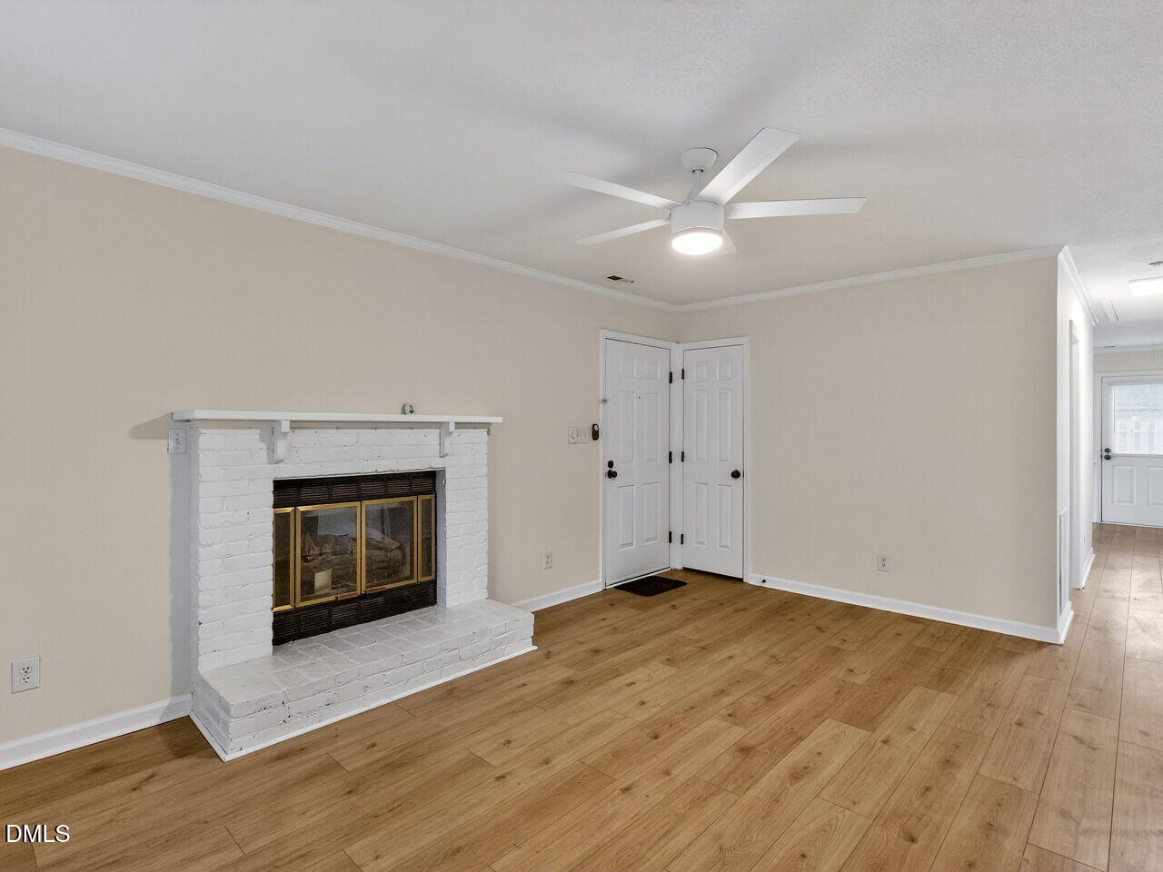 113 Towne View Trail Garner, NC 27529 - Photo 6 of 30 a view of empty room with wooden floor and fireplace