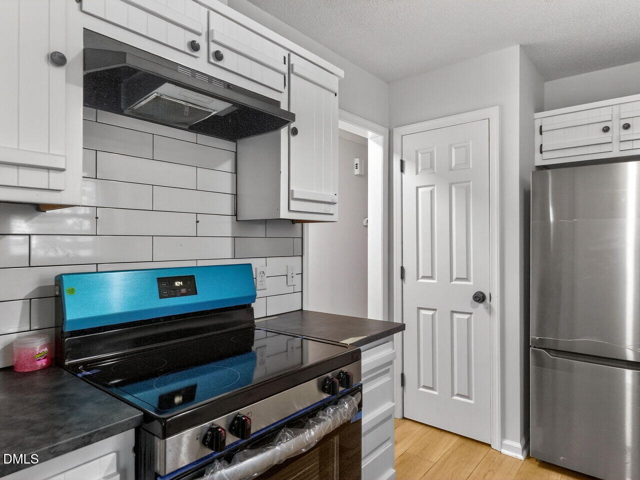 113 Towne View Trail Garner, NC 27529 - Photo 10 of 30 a kitchen with appliances and cabinets