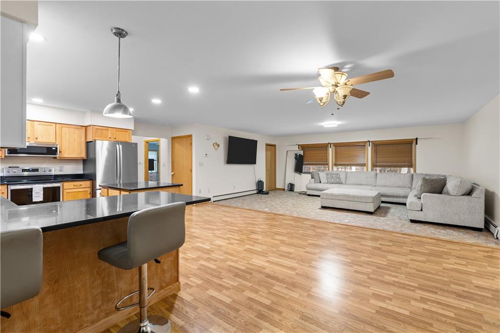 178 Christopher Road Flinton, PA 16640 - Photo 16 of 41 a living room with fireplace furniture and a wooden floor