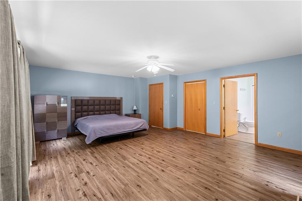 178 Christopher Road Flinton, PA 16640 - Photo 19 of 41 a bedroom with a bed and wooden floor