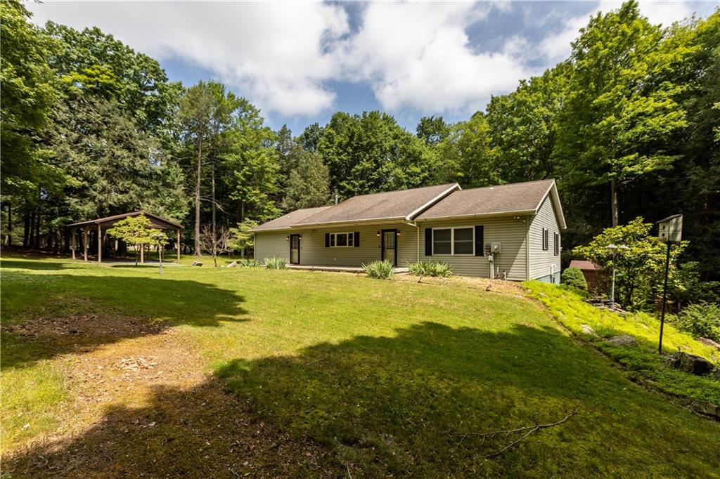 178 Christopher Road Flinton, PA 16640 - Photo 41 of 41 a front view of a house with a garden