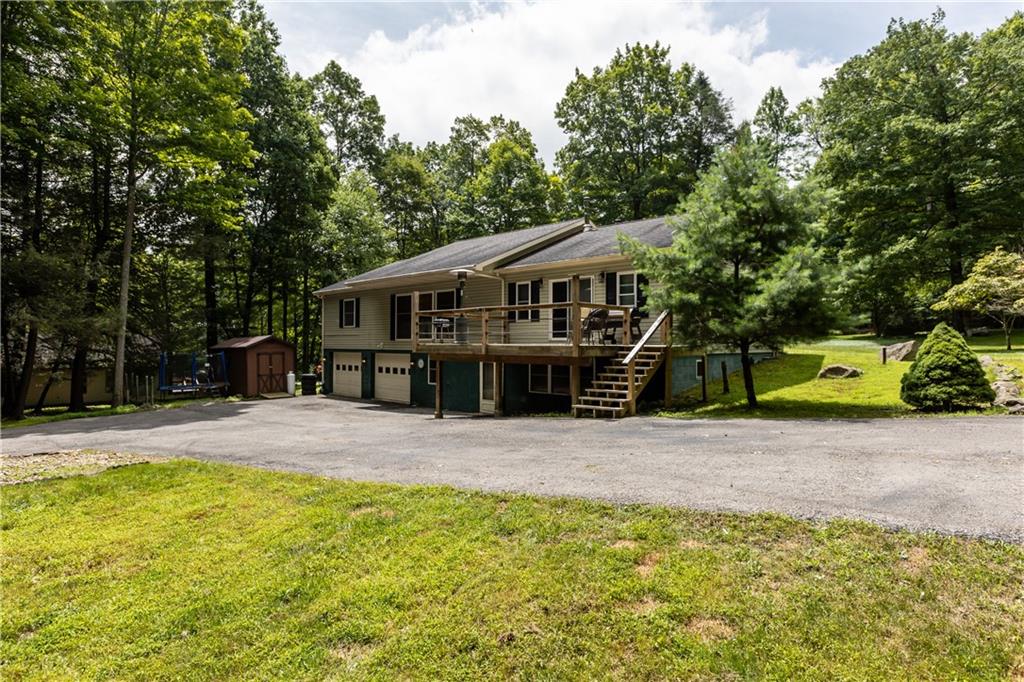 178 Christopher Road Flinton, PA 16640 - Photo 5 of 41 a front view of a house with a yard and trees