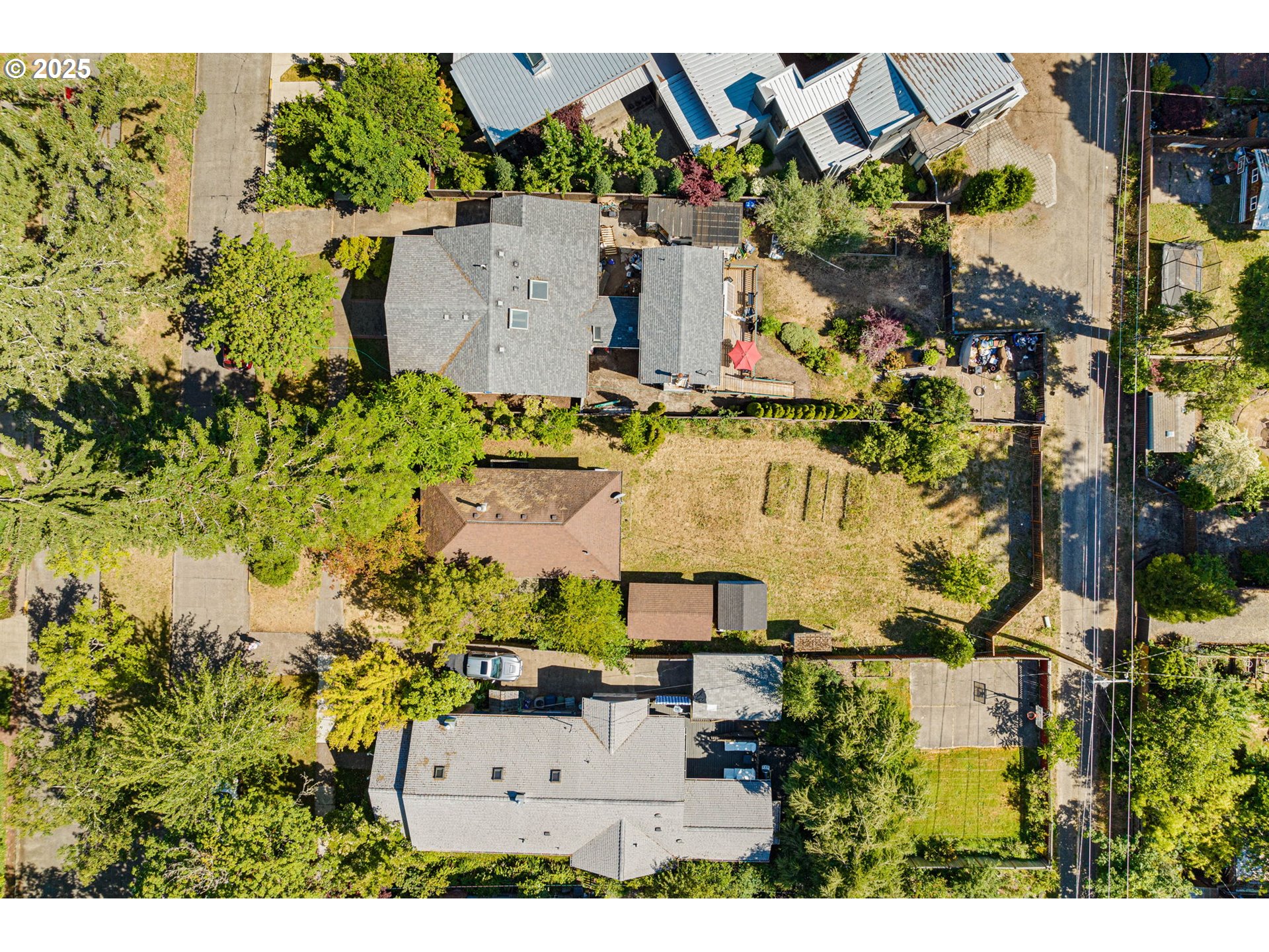 Orchard Alley Eugene, OR 97403 - Photo 10 of 13 an aerial view of residential house with outdoor space