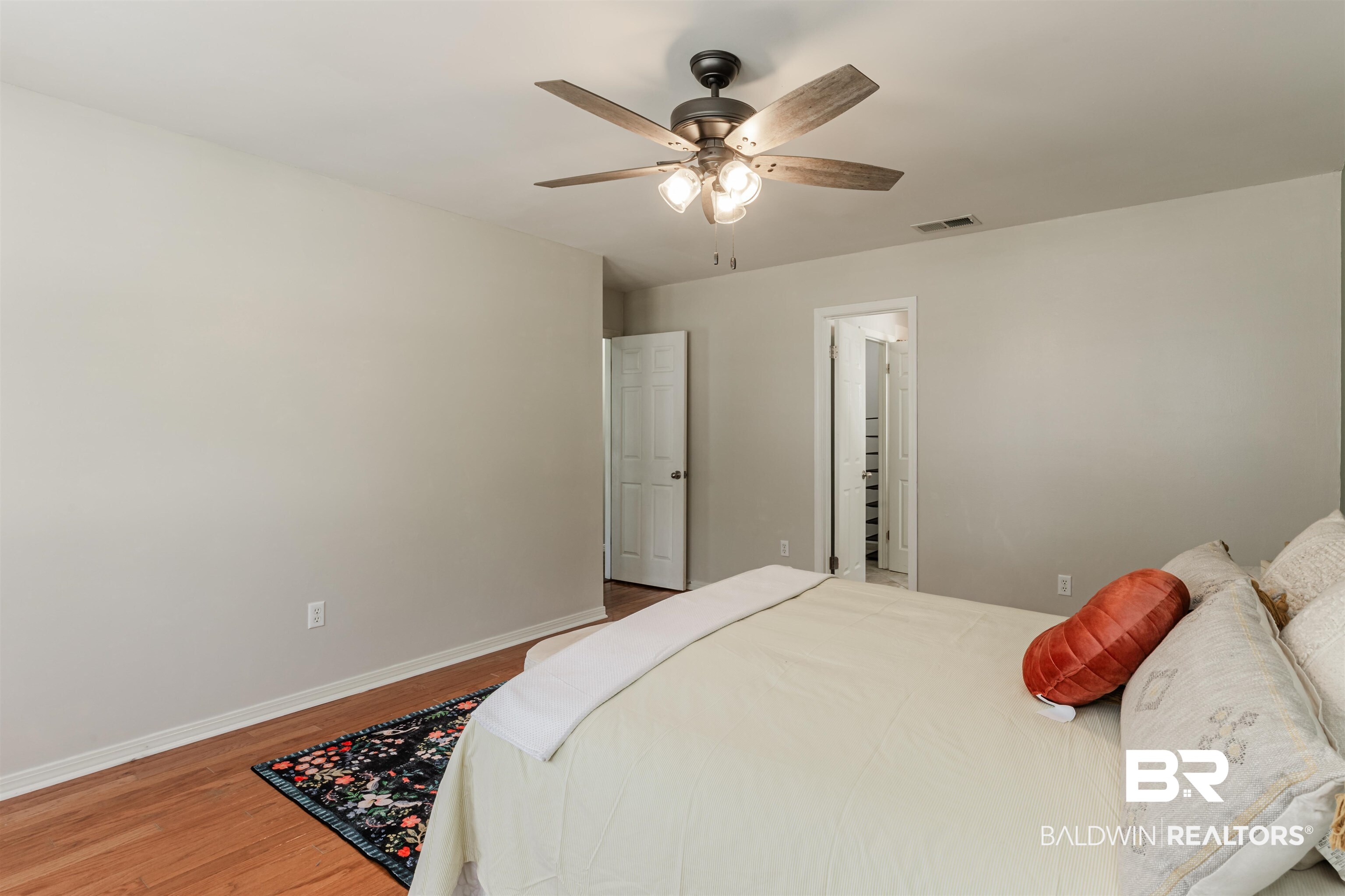 3844 Isabel Way South Mobile, AL 36693 - Photo 22 of 49 Bedroom featuring wood-type flooring and ceiling fan