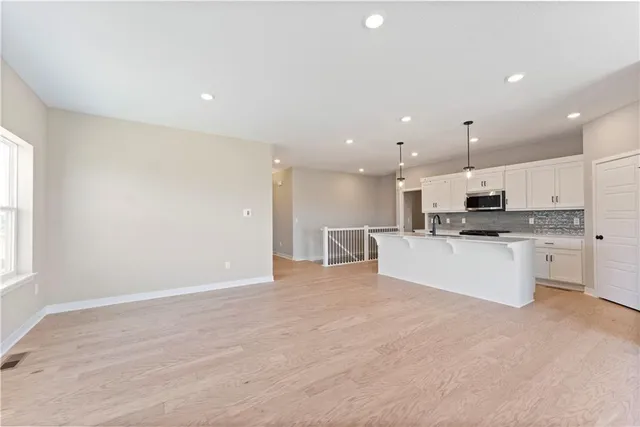 $336,695 | 1210 Southeast Windbreak Drive, Lee's Summit, MO 64081