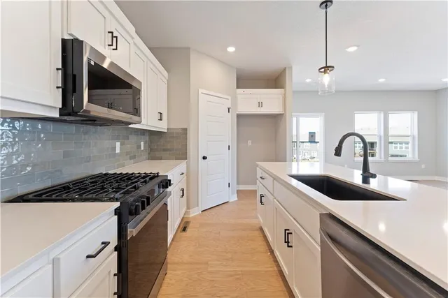 $336,695 | 1210 Southeast Windbreak Drive, Lee's Summit, MO 64081