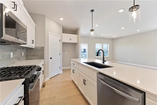 $336,695 | 1210 Southeast Windbreak Drive, Lee's Summit, MO 64081