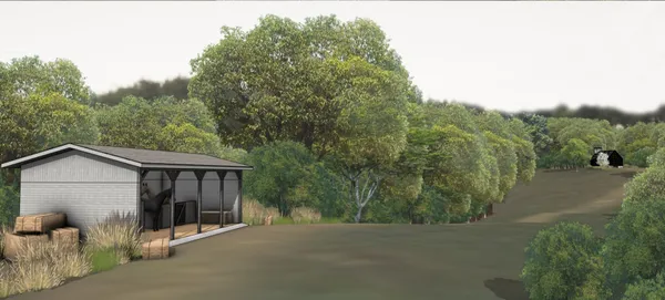 a view of a yard with a house in the background
