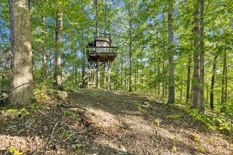 a view of a lake from a balcony