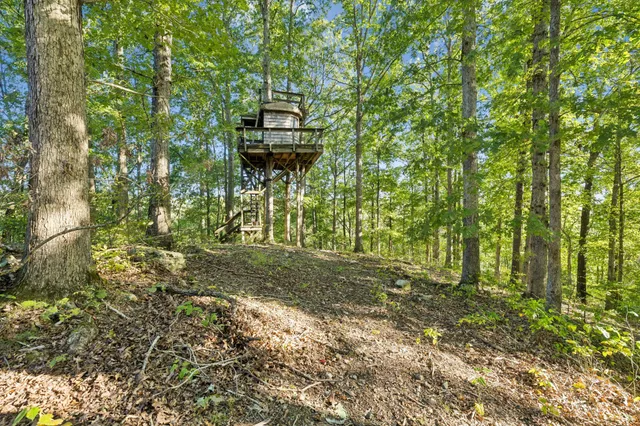 a view of a lake from a balcony