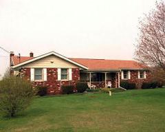1393 Clearfield Road Nazareth, PA 18064 - Photo 1 of 1 a front view of a house with a yard and trees