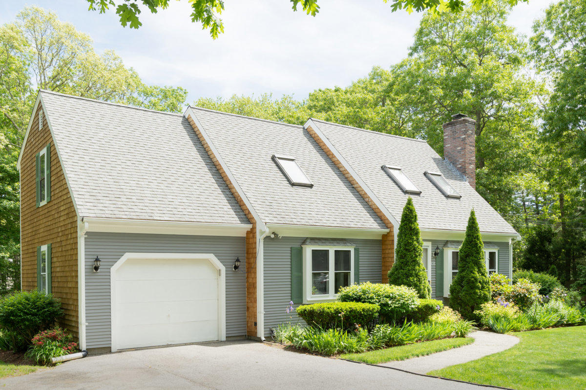 636 Lumbert Mill Road Centerville, MA 02632 - Photo 1 of 23 a aerial view of a house with a yard