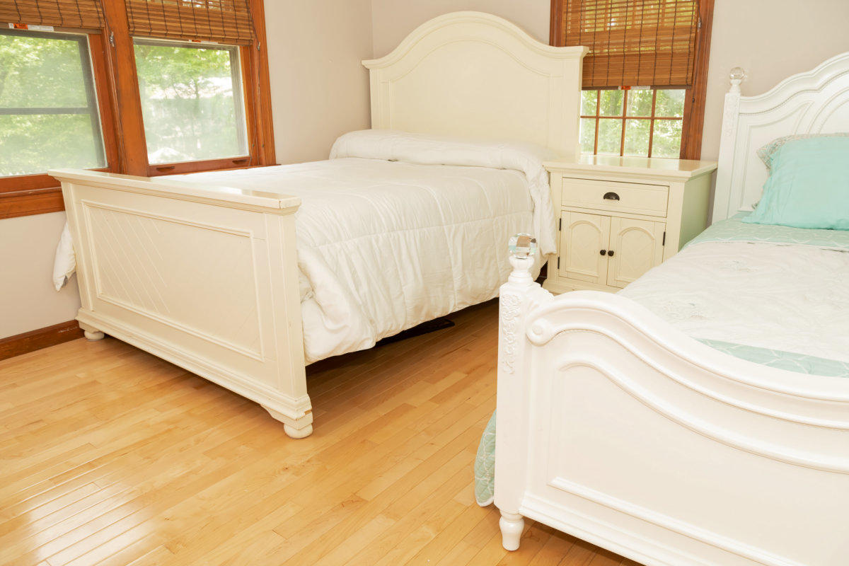 636 Lumbert Mill Road Centerville, MA 02632 - Photo 17 of 23 a bedroom with a bed a window and dresser