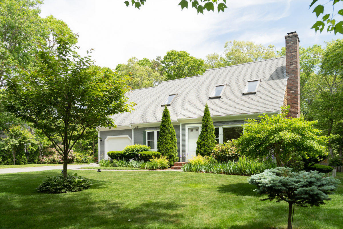 636 Lumbert Mill Road Centerville, MA 02632 - Photo 23 of 23 a front view of a house with a yard