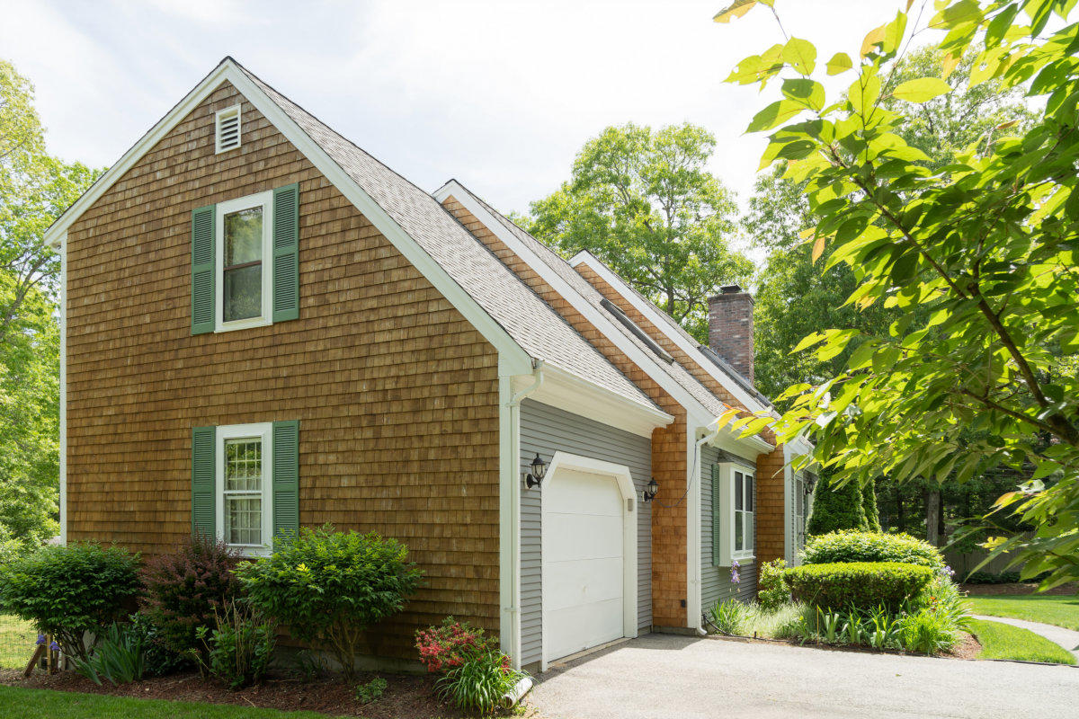 636 Lumbert Mill Road Centerville, MA 02632 - Photo 3 of 23 a view of a house with a yard