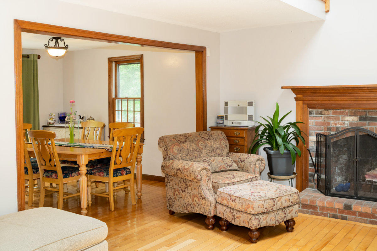 636 Lumbert Mill Road Centerville, MA 02632 - Photo 4 of 23 a living room with furniture and a fireplace