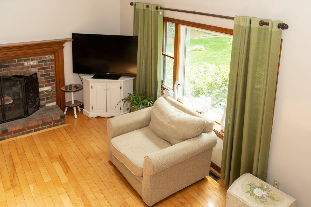 636 Lumbert Mill Road Centerville, MA 02632 - Photo 10 of 23 a living room with furniture and a flat screen tv