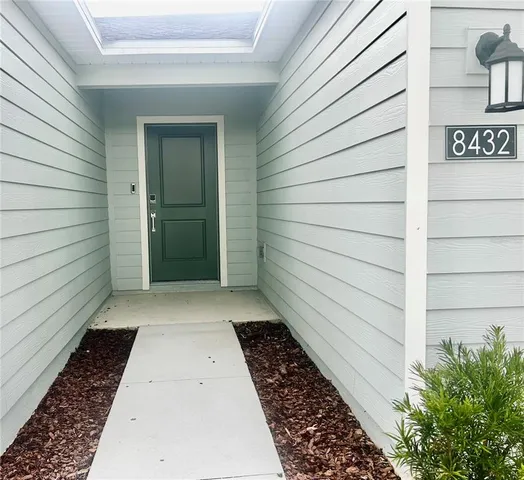a view of a back yard of the house