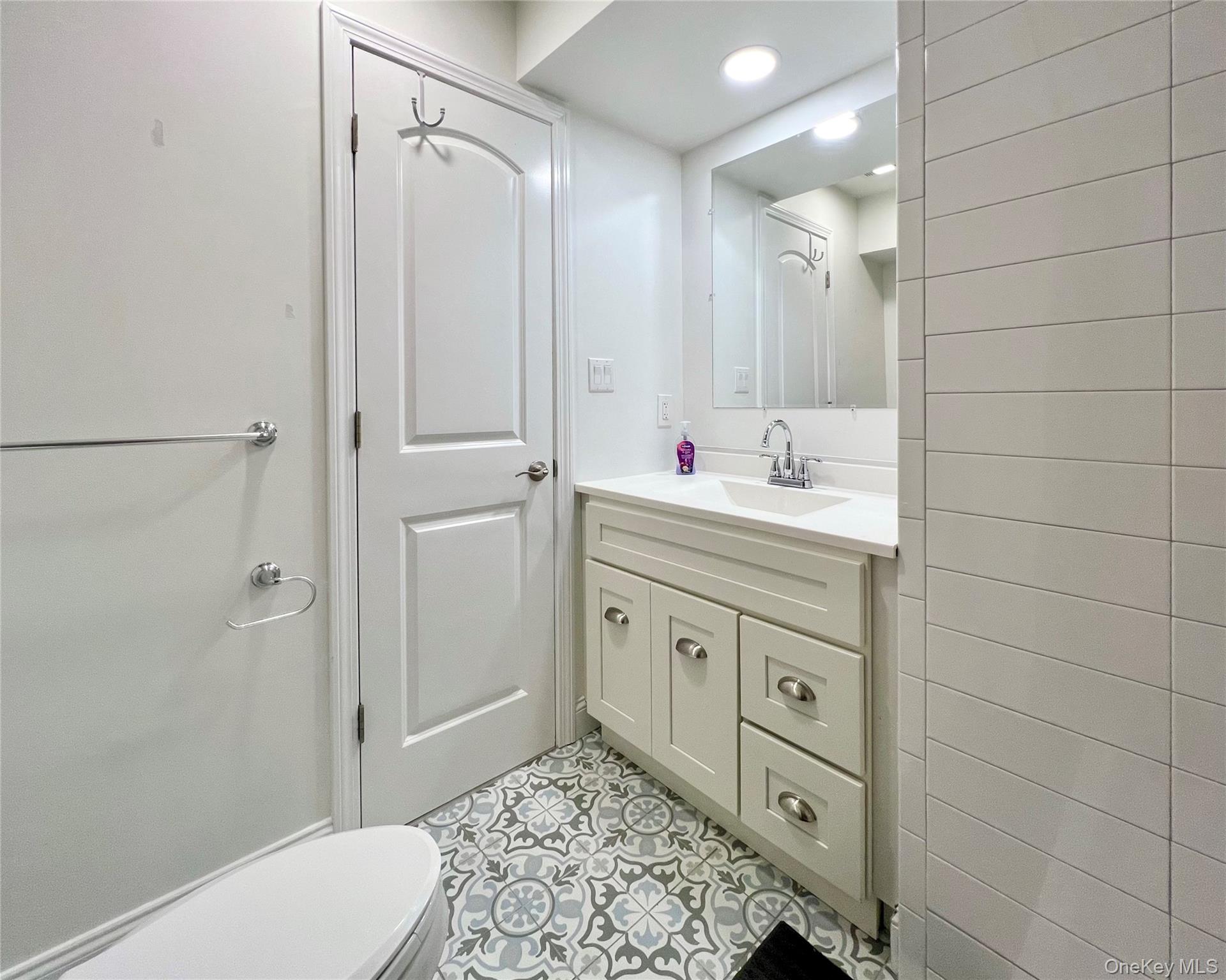 16 Albano Ridge, Unit 1 Carmel, NY 10512 - Photo 6 of 6 a spacious bathroom with a double vanity sink toilet and shower