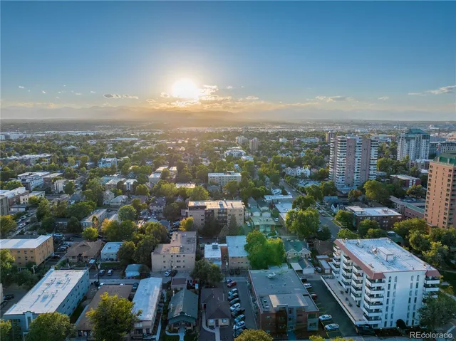 a view of a city with tall buildings in the background