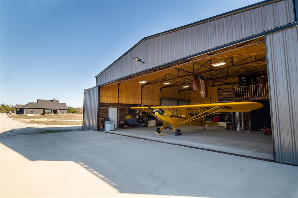 375 Wolf Front Road Van Alstyne, TX 75495 - Photo 20 of 40 a view of a swimming pool with an outdoor seating