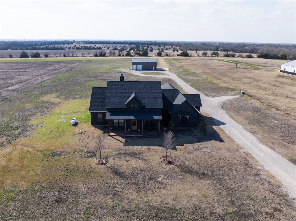 375 Wolf Front Road Van Alstyne, TX 75495 - Photo 3 of 40 a view of a lake with outdoor space