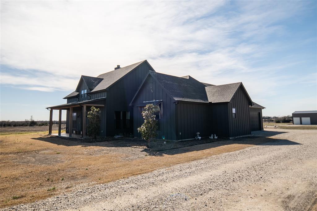 375 Wolf Front Road Van Alstyne, TX 75495 - Photo 31 of 40 a front view of a house with a yard