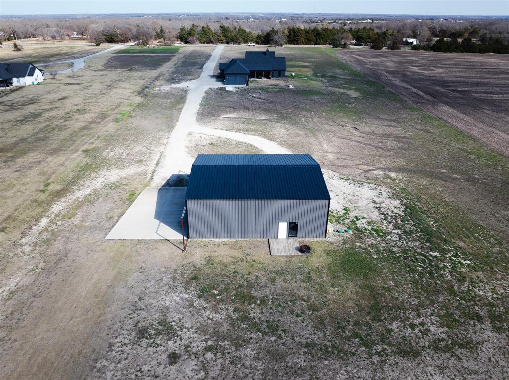 375 Wolf Front Road Van Alstyne, TX 75495 - Photo 40 of 40 a view of a dry yard with wooden fence