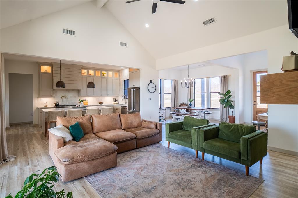 375 Wolf Front Road Van Alstyne, TX 75495 - Photo 4 of 40 a living room with furniture and a large window