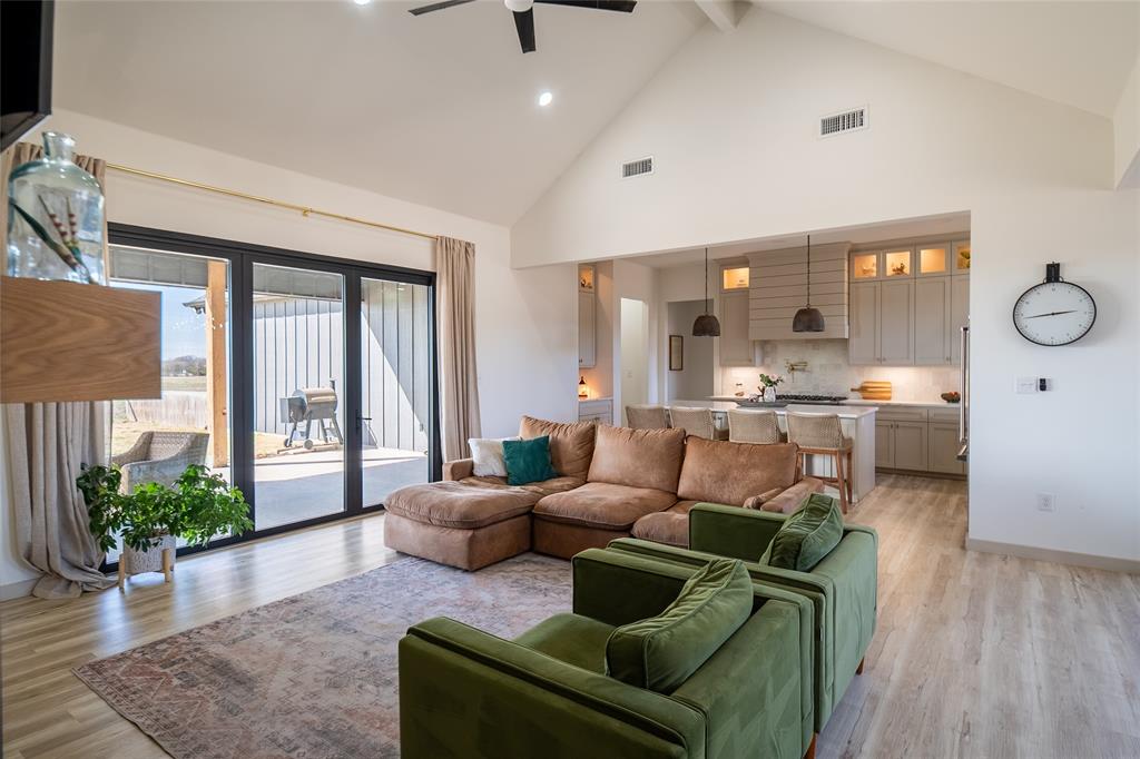 375 Wolf Front Road Van Alstyne, TX 75495 - Photo 5 of 40 a living room with furniture and a large window