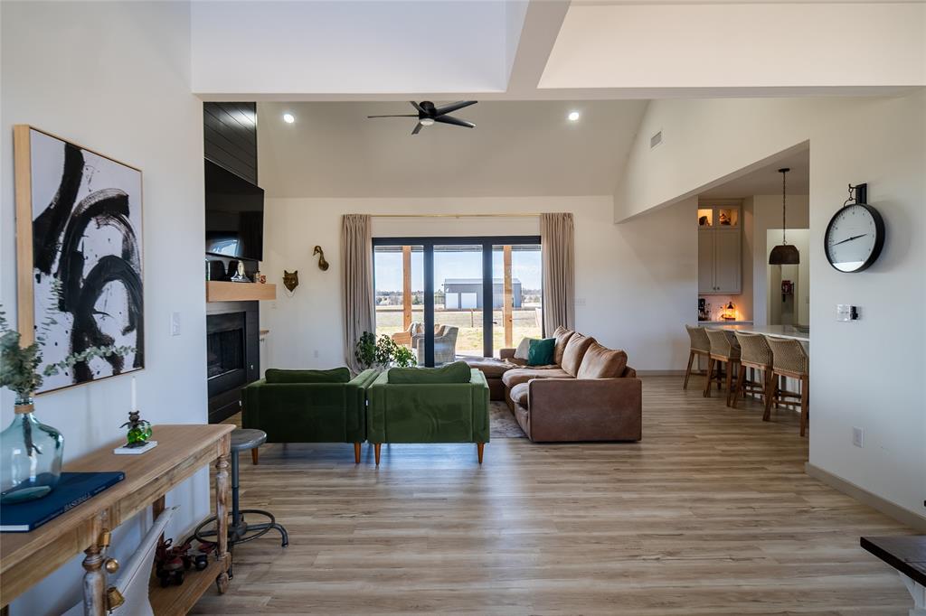375 Wolf Front Road Van Alstyne, TX 75495 - Photo 8 of 40 a living room with furniture and a large window