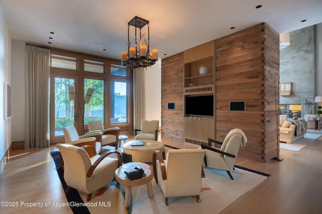 a bathroom with a granite countertop sink mirror vanity and toilet