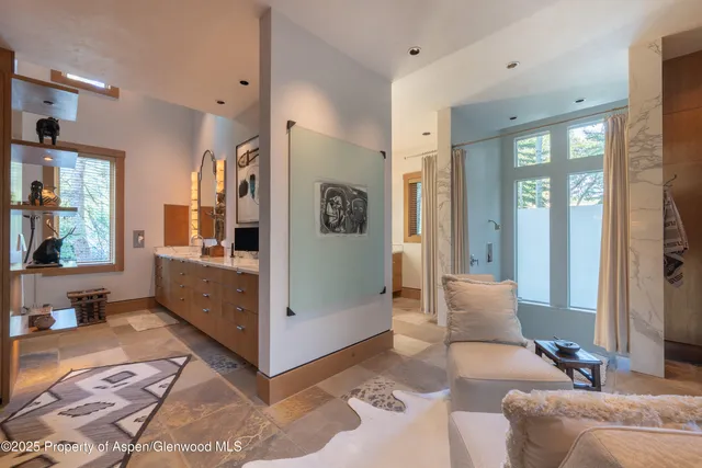a view of a kitchen from the room