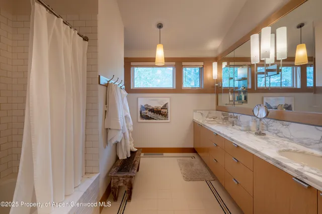 a aerial view of a house with a yard