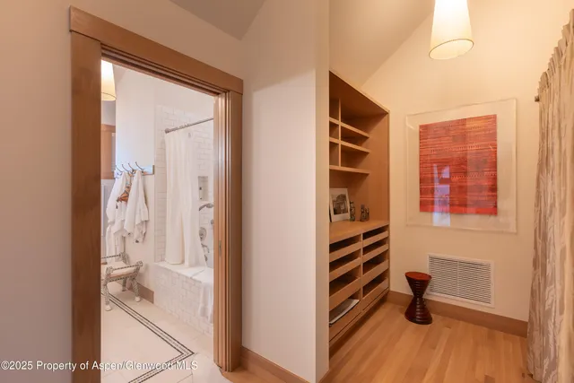 a view of a park with large trees