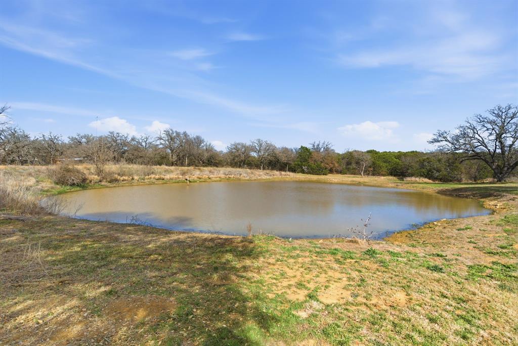 1601 A Stafford Road Weatherford, TX 76088 - Photo 25 of 34 a view of a lake from a yard