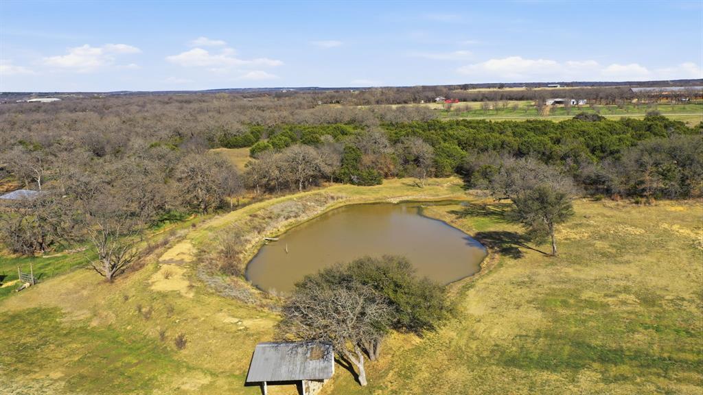 1601 A Stafford Road Weatherford, TX 76088 - Photo 33 of 34 a view of a swimming pool with a yard