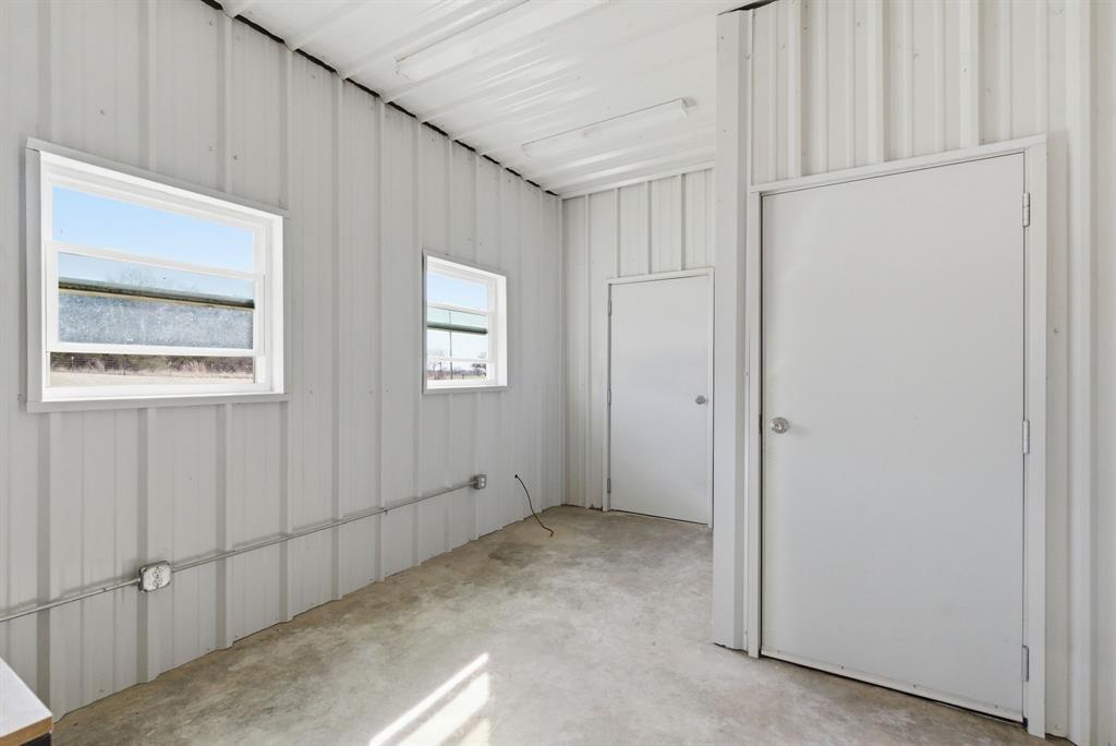 1601 A Stafford Road Weatherford, TX 76088 - Photo 10 of 34 a view of an empty room with windows