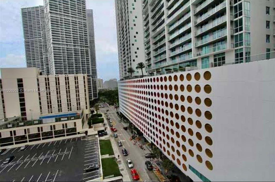 41 Southeast 5th Street, Unit 702 Miami, FL 33131 - Photo 14 of 23 a view of a balcony