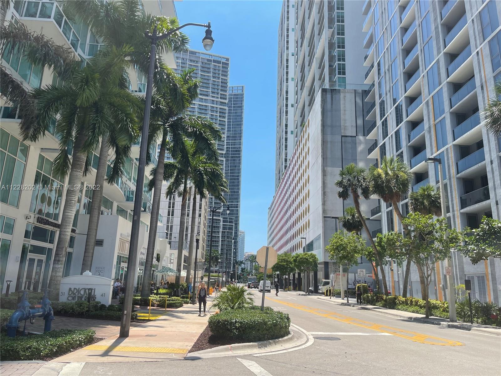 41 Southeast 5th Street, Unit 702 Miami, FL 33131 - Photo 2 of 23 a view of a building along the street