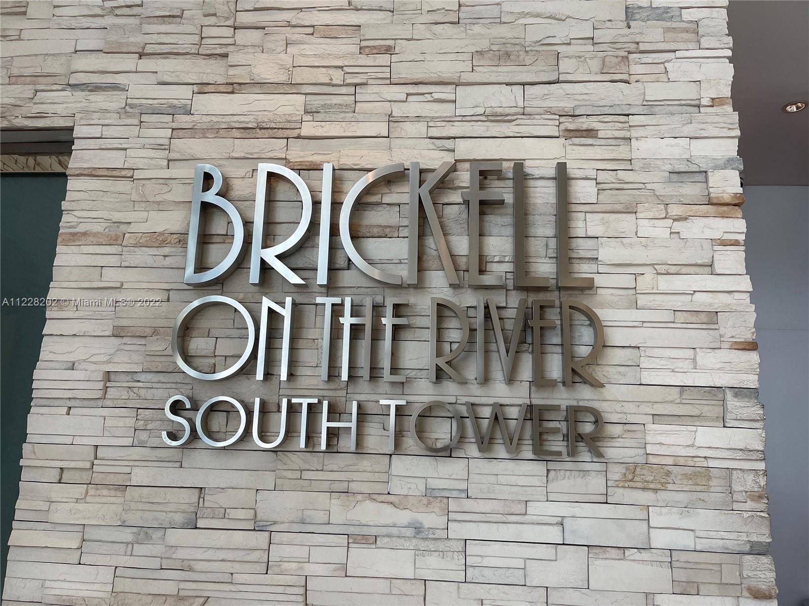 41 Southeast 5th Street, Unit 702 Miami, FL 33131 - Photo 4 of 23 a close up of a brick wall