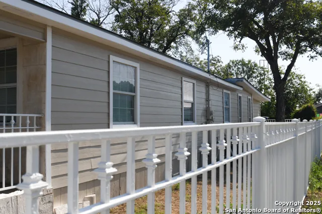 a balcony view with a garden
