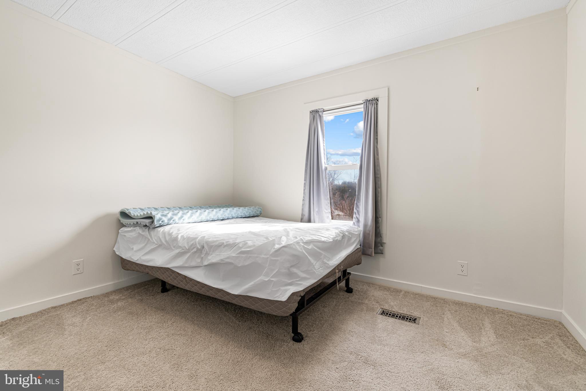 254 Rabbit Run North Wales, PA 19454 - Photo 15 of 22 a bed sitting in a room next to a window