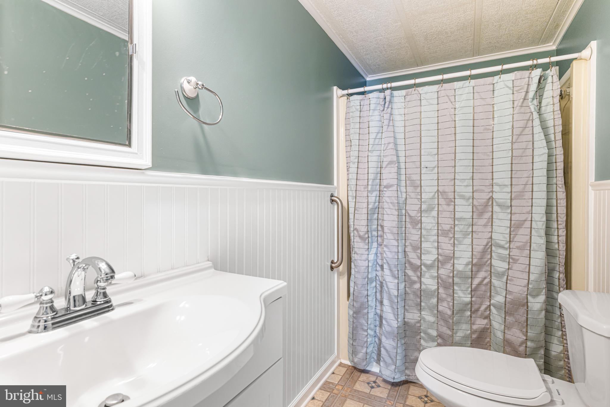 254 Rabbit Run North Wales, PA 19454 - Photo 16 of 22 a bathroom with a sink and toilet
