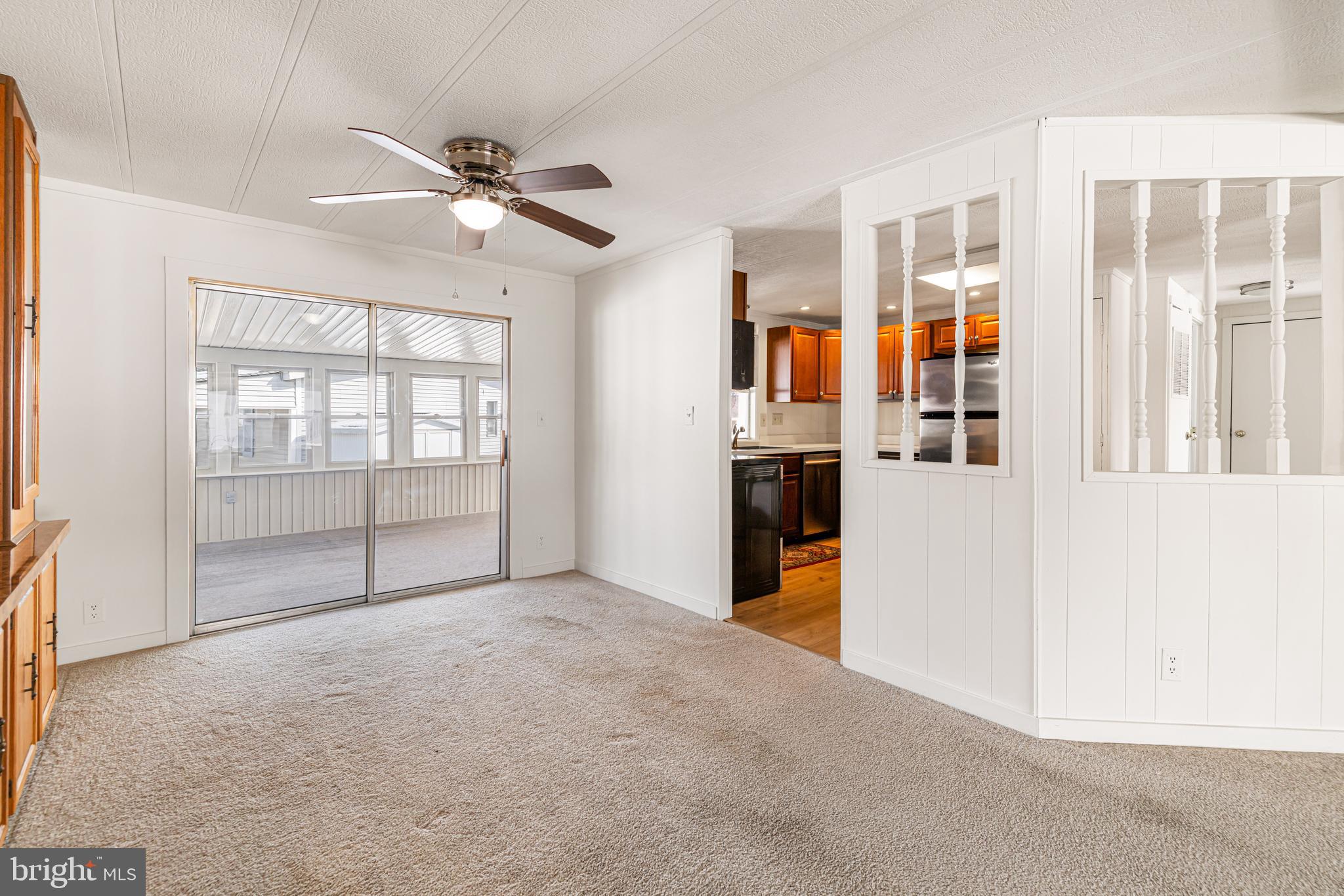 254 Rabbit Run North Wales, PA 19454 - Photo 6 of 22 a view of empty room with cabinet and windows
