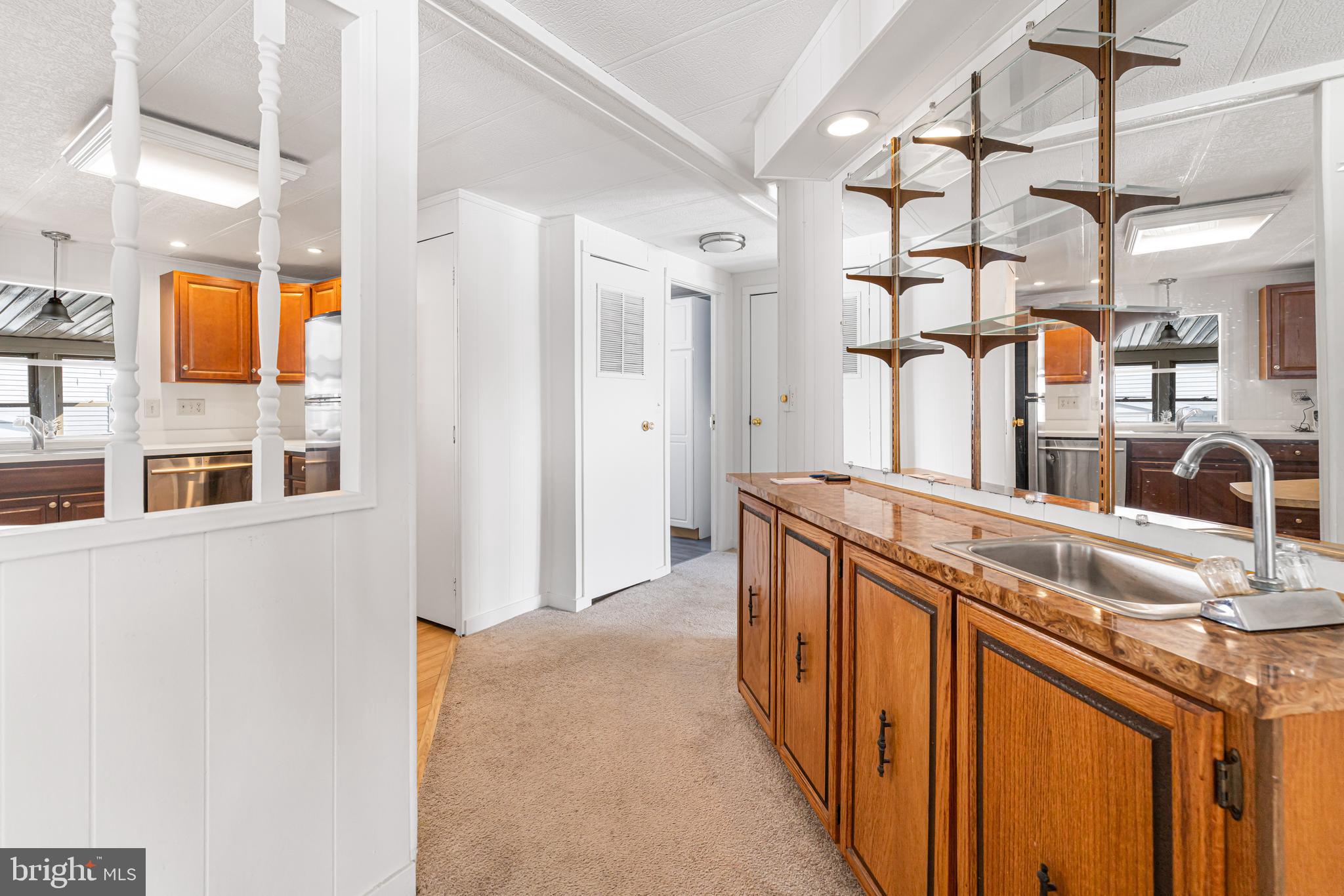 254 Rabbit Run North Wales, PA 19454 - Photo 7 of 22 a en suite bathroom with a granite countertop sink and a large mirror