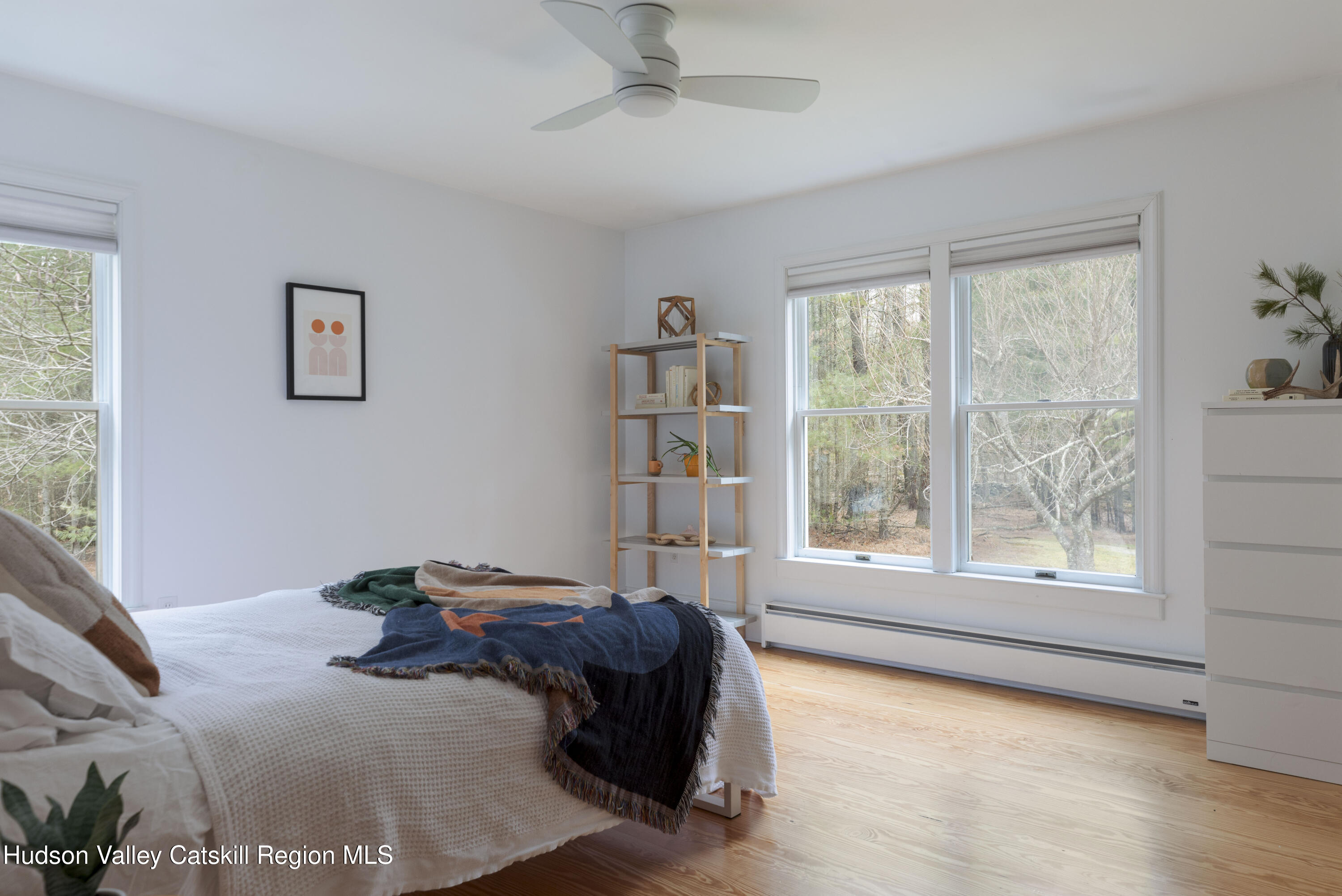 31 Joy Ridge Saugerties, NY 12477 - Photo 14 of 39 a bed room with a bed and a large window